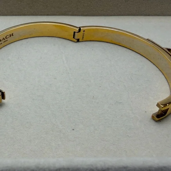 Coach Gold Hinged Bracelet with Crystal Accent Charm - Picture 3 of 4